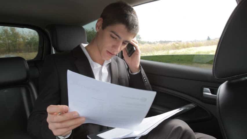 Crete Taxi Transfers refunds & returns policy. Man reading contracts